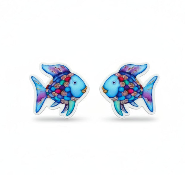 Pair of fish-shaped earrings on a &