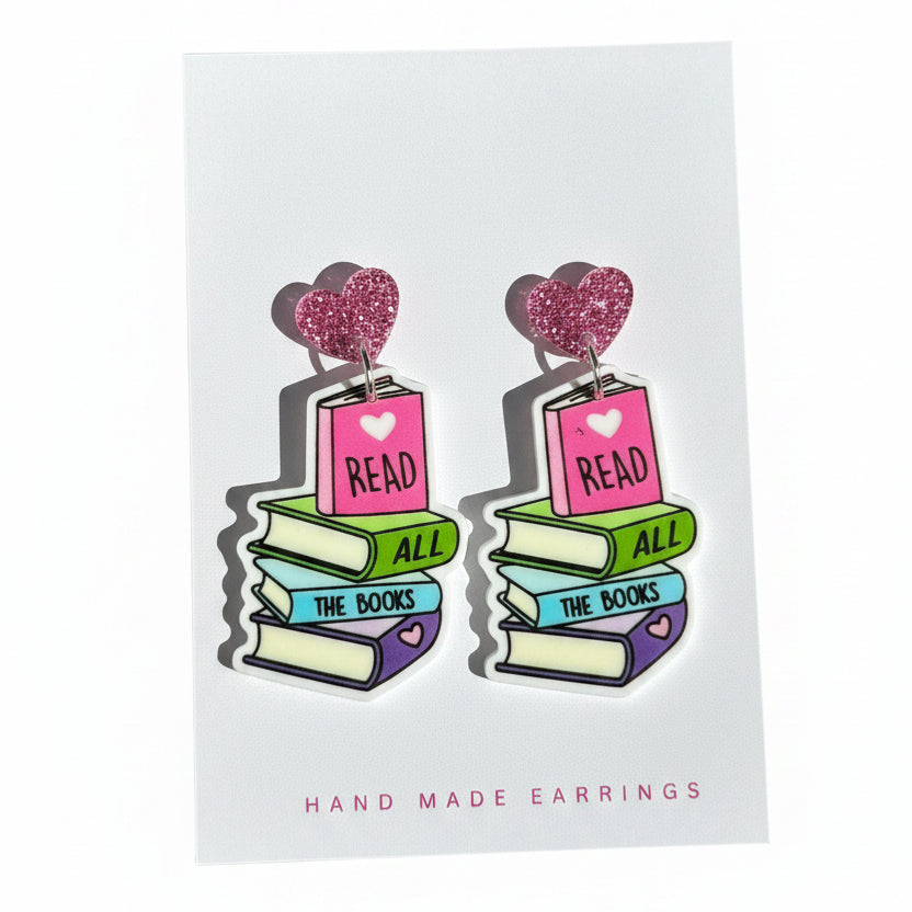 Pair of earrings on a card with &