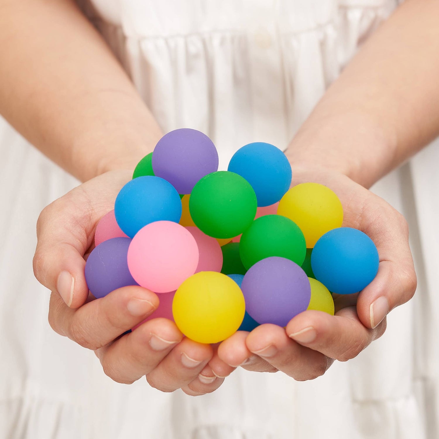 70 Mini Neon Coloured Bouncing Balls in a Tub