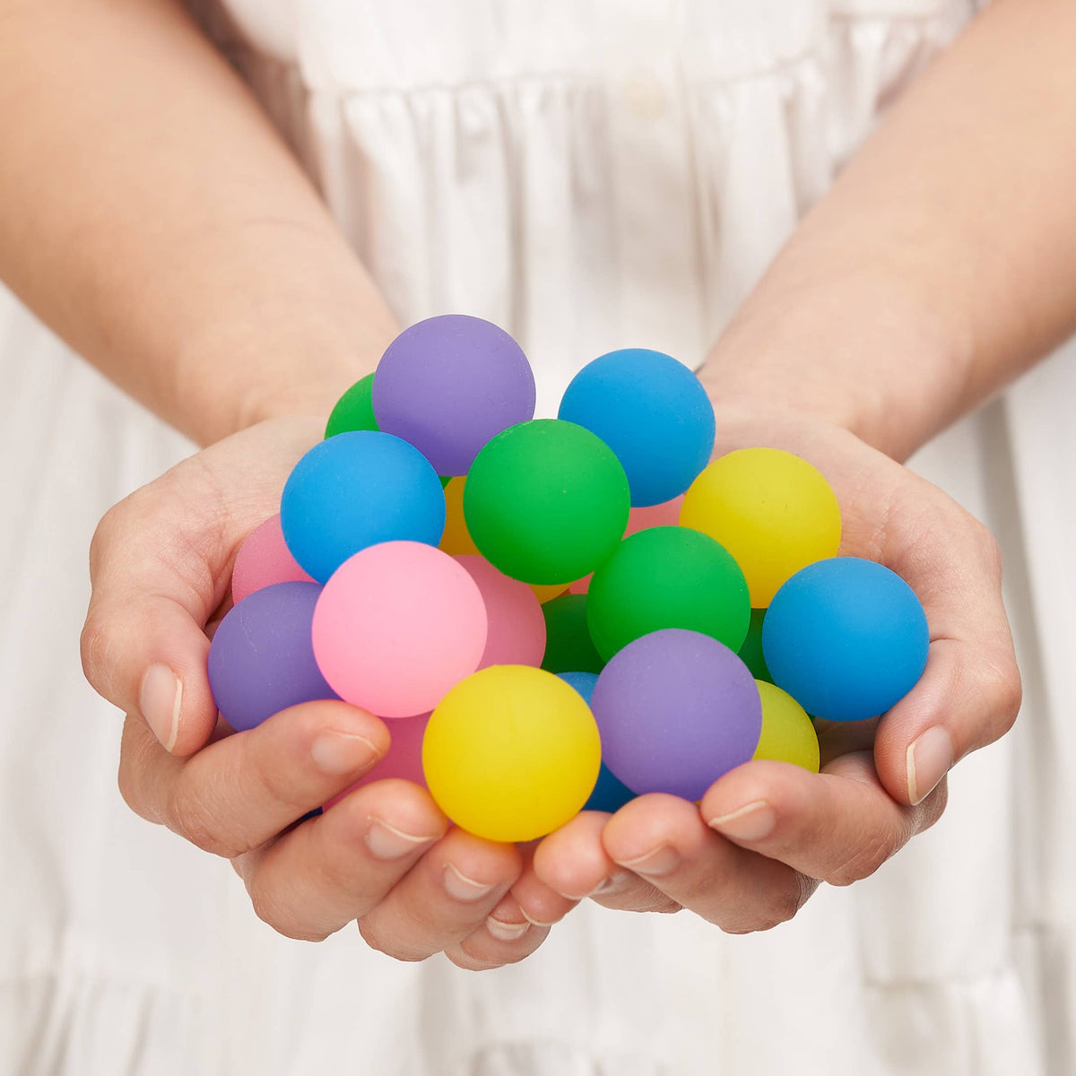 70 Mini Neon Coloured Bouncing Balls in a Tub